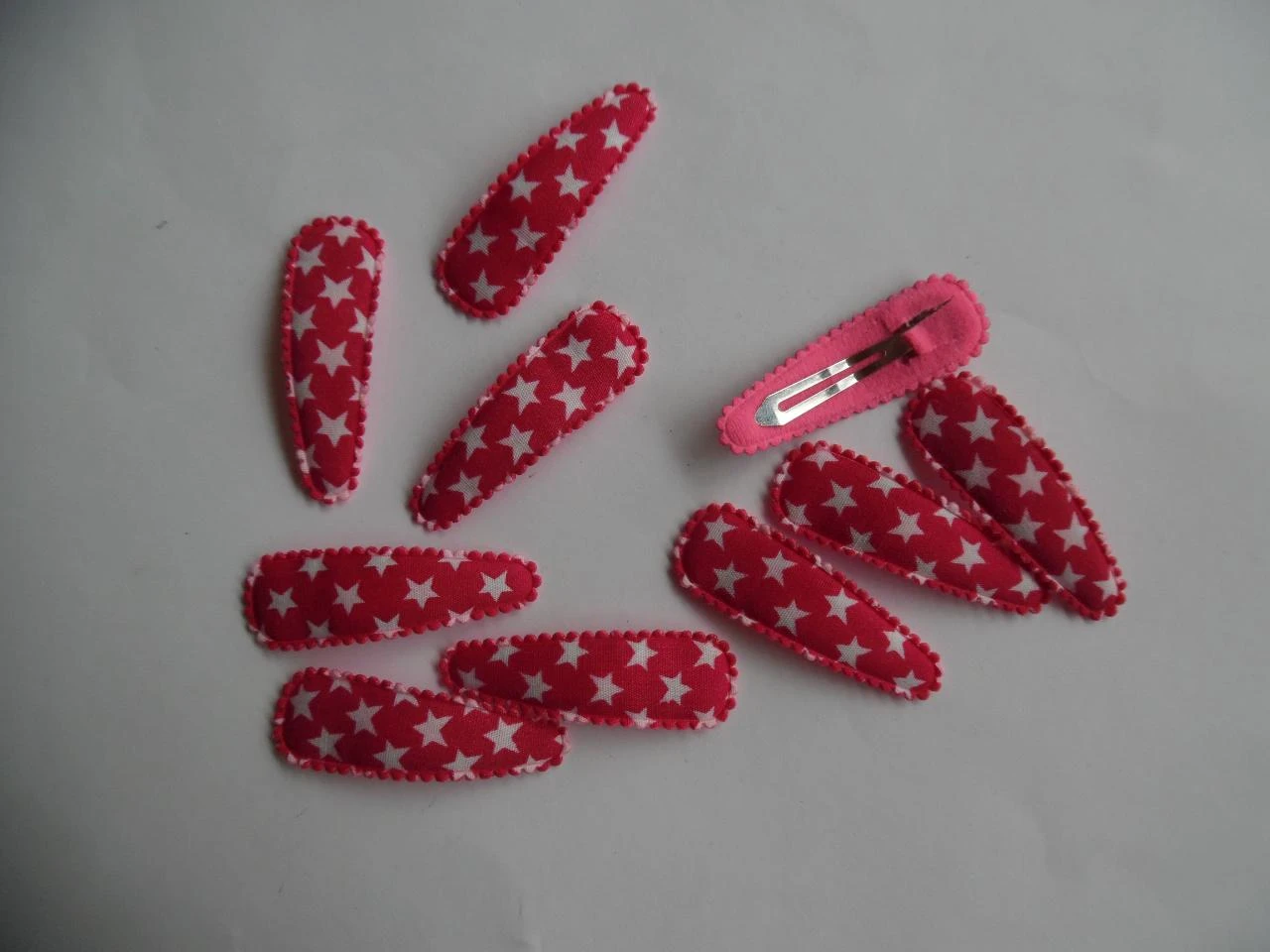 Partij 10 haarspeldjes 5 cm fuchsia met ster